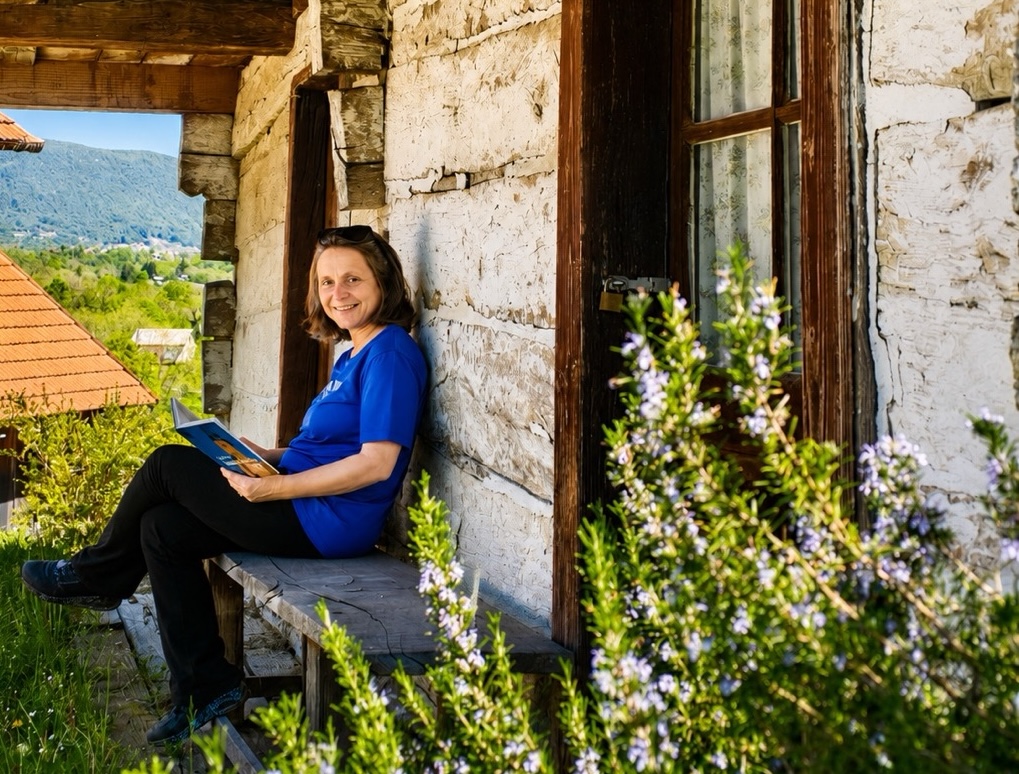 A woman at the porch in Croatian countryside